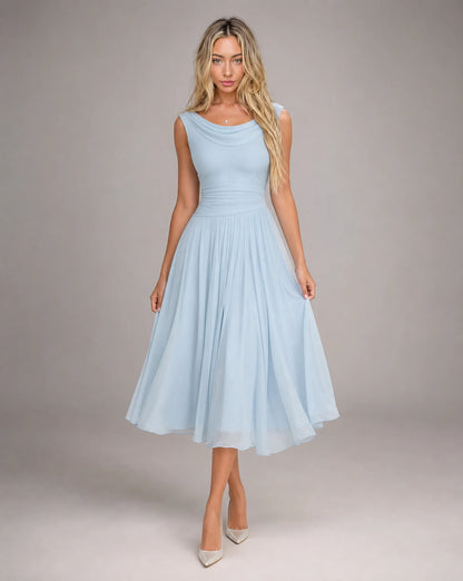 Women's sky blue draped cowl neck pleated midi dress with flowing pleated skirt and refined wedding guest style by ILYNORA