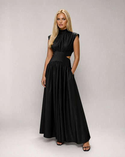 Black sleeveless cut out maxi dress for women by Ilynora, front view with elegant drape and refined silhouette