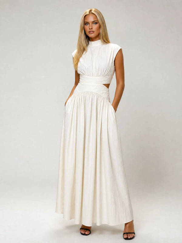 White sleeveless cut out maxi dress for women by Ilynora, front view with elegant silhouette and flowing skirt