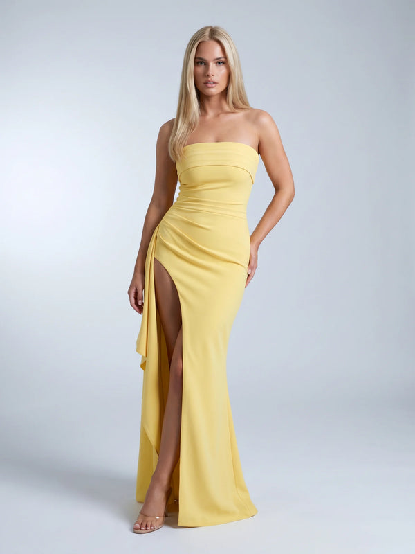 Yellow strapless ruched maxi dress for women by Ilynora, front view with elegant silhouette and thigh high split