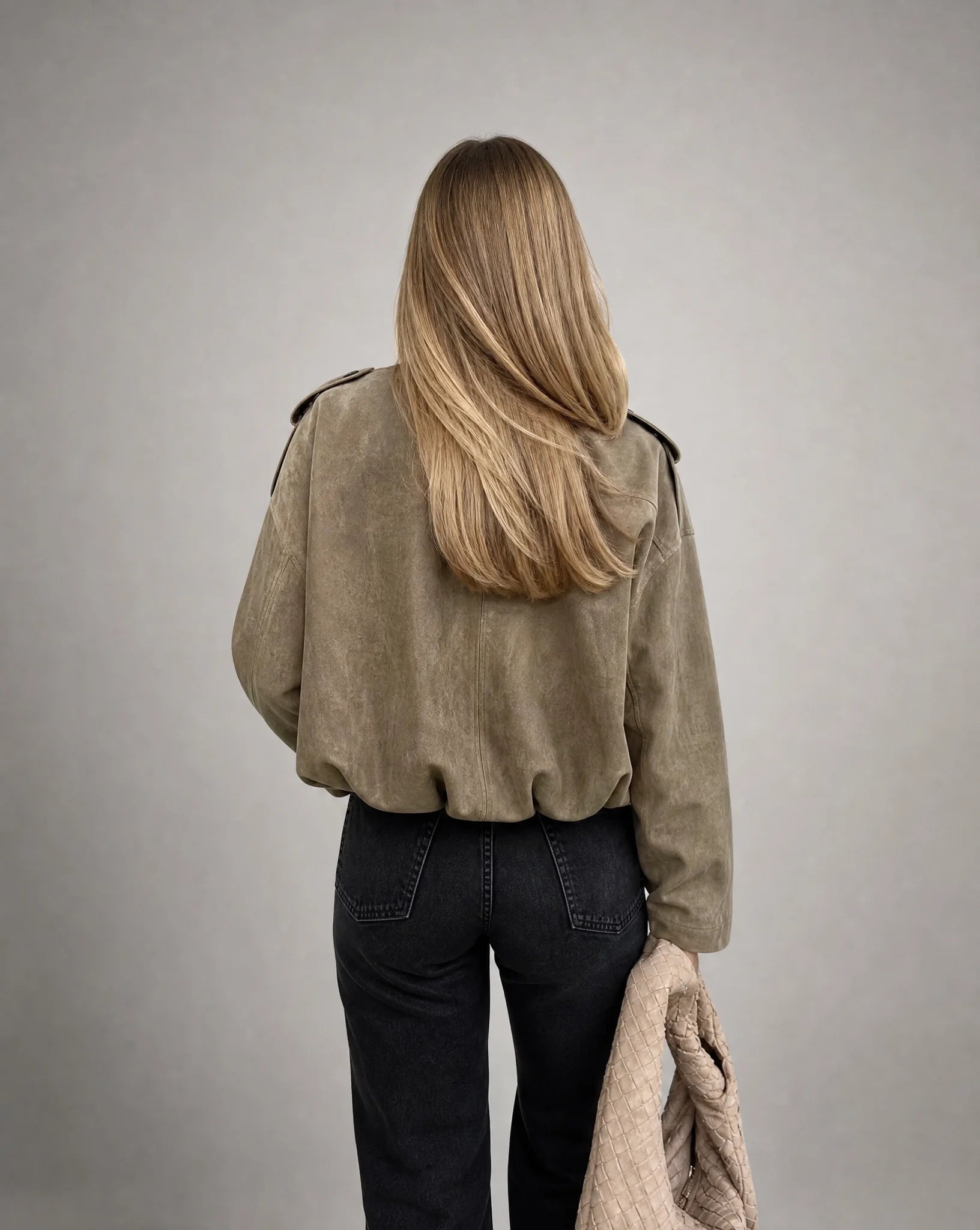 Army green suede bomber jacket for women by Ilynora, back view showcasing the oversized fit and soft texture