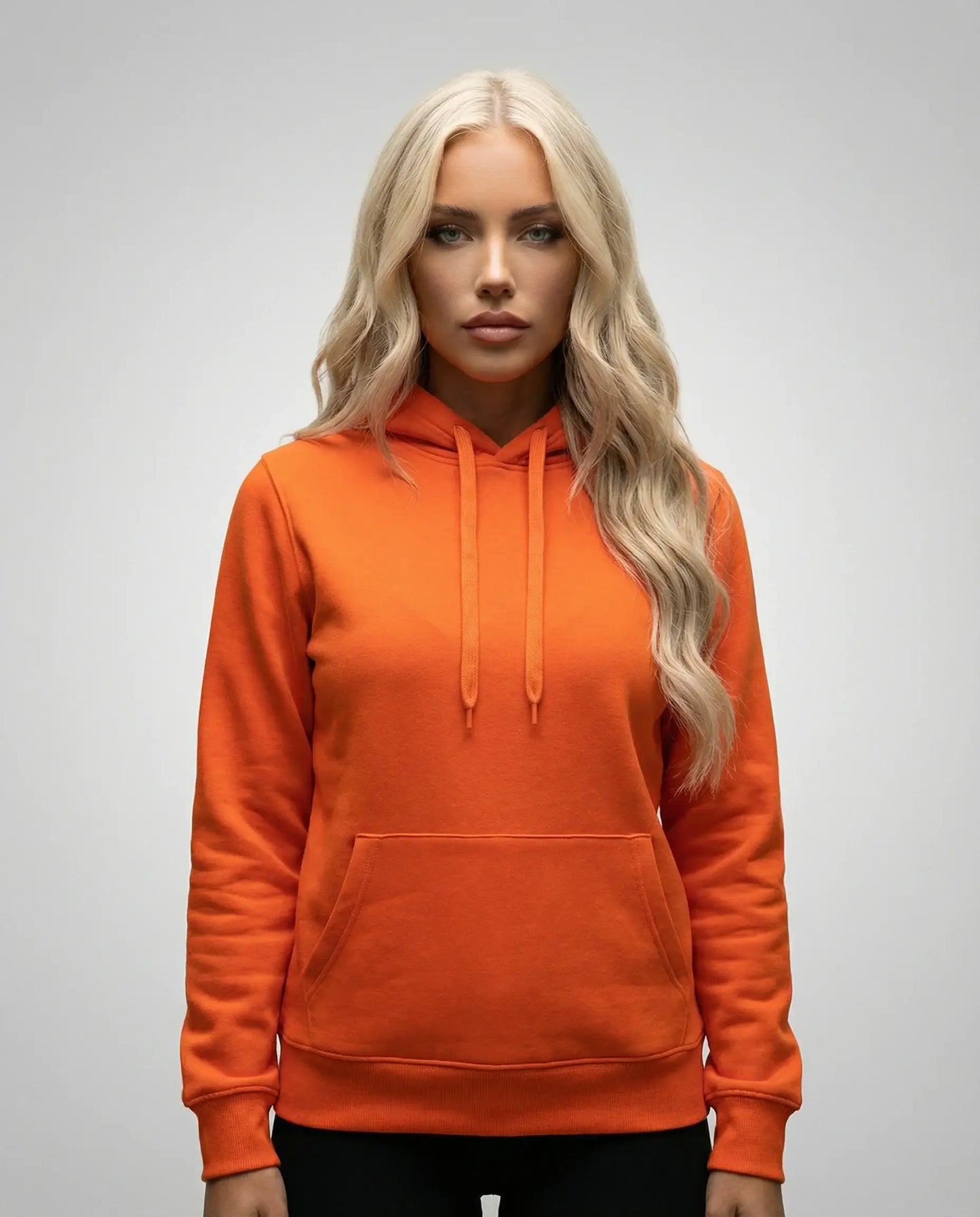 Orange unisex hoodie by Ilynora, front view with bold color and clean silhouette