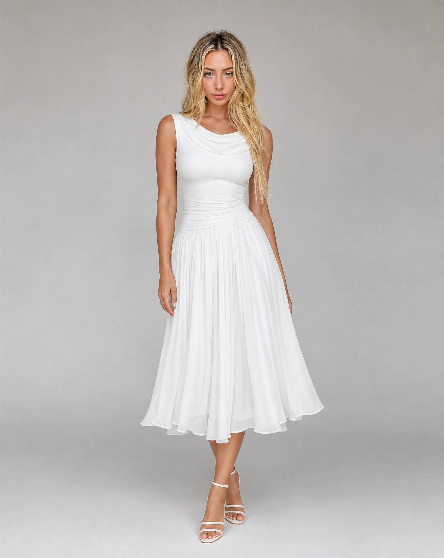 Front view of women's white draped cowl neck pleated midi dress with sleeveless bodice, elegant pleated skirt and timeless formal style by ILYNORA