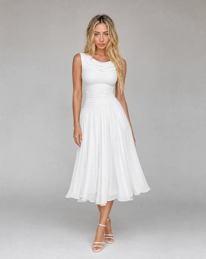 Front view of women's white draped cowl neck pleated midi dress with sleeveless bodice, elegant pleated skirt and timeless formal style by ILYNORA
