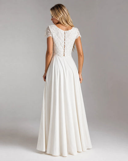 Back view of women's white bohemian lace high low wedding dress with elegant two-piece design and flowing bridal skirt by ILYNORA