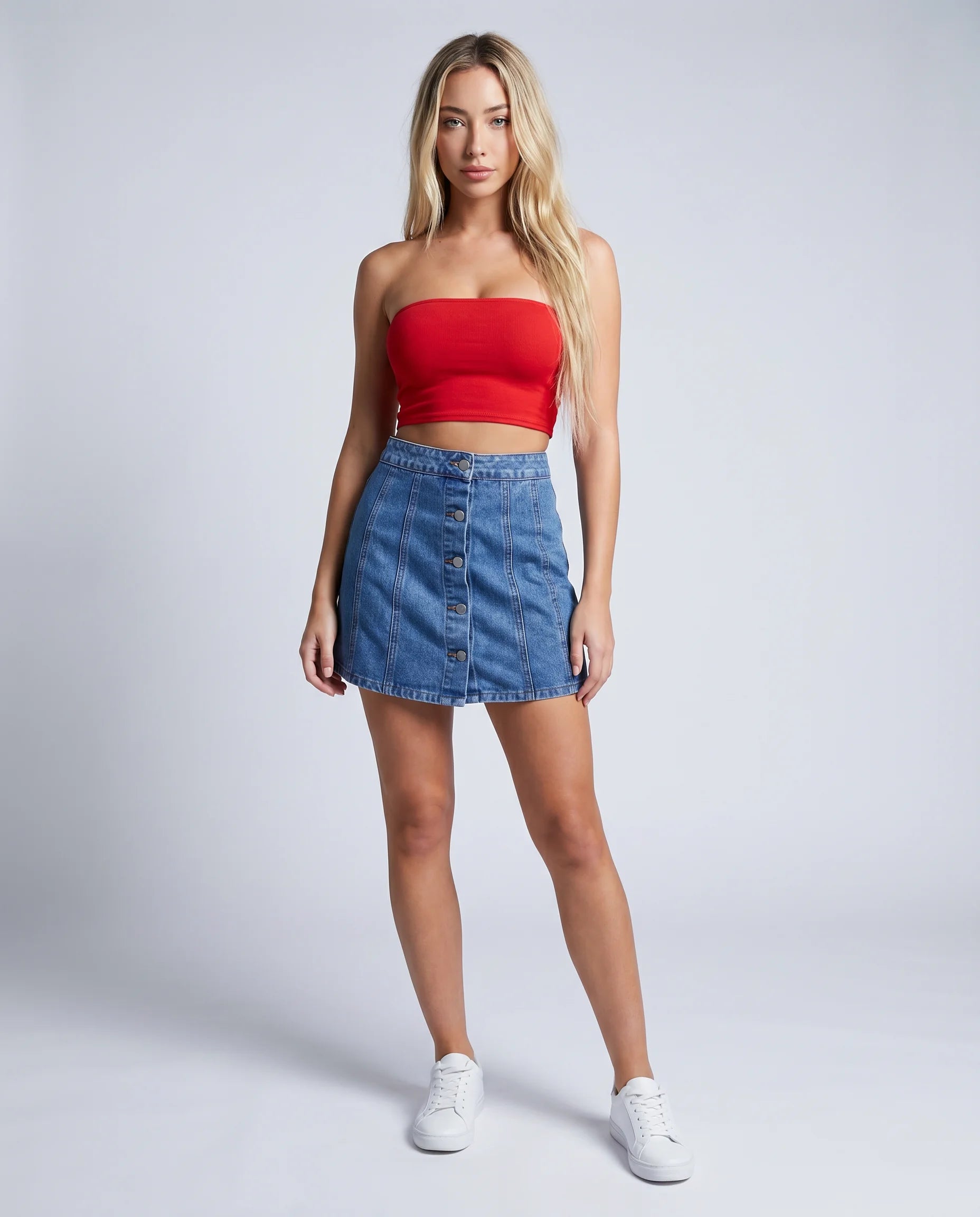 Blue denim A-line mini skirt with button front detail and flattering high waist silhouette by ILYNORA