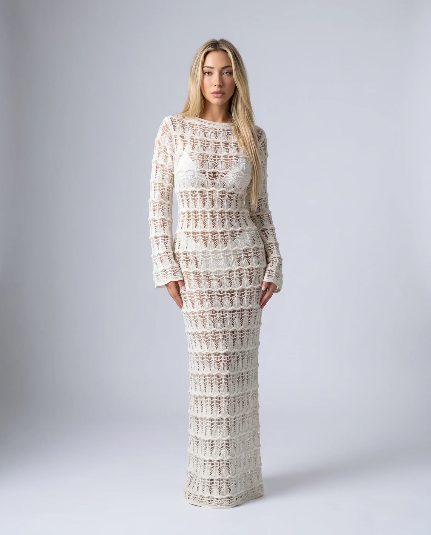 Women's beige crochet maxi cover up dress with button front, long sleeves and semi sheer knit beach style by ILYNORA