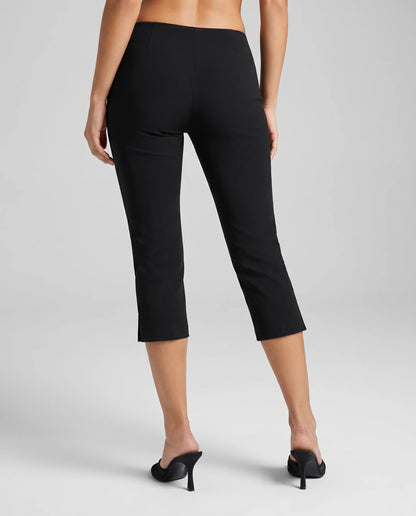Women's black tailored capri trousers with cropped length, comfortable stretch fabric and back view by ILYNORA