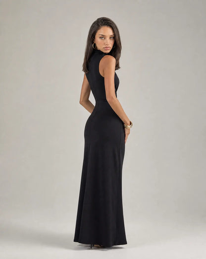 Black high neck ruched maxi dress for women by Ilynora, side view highlighting the fitted silhouette and waist detail