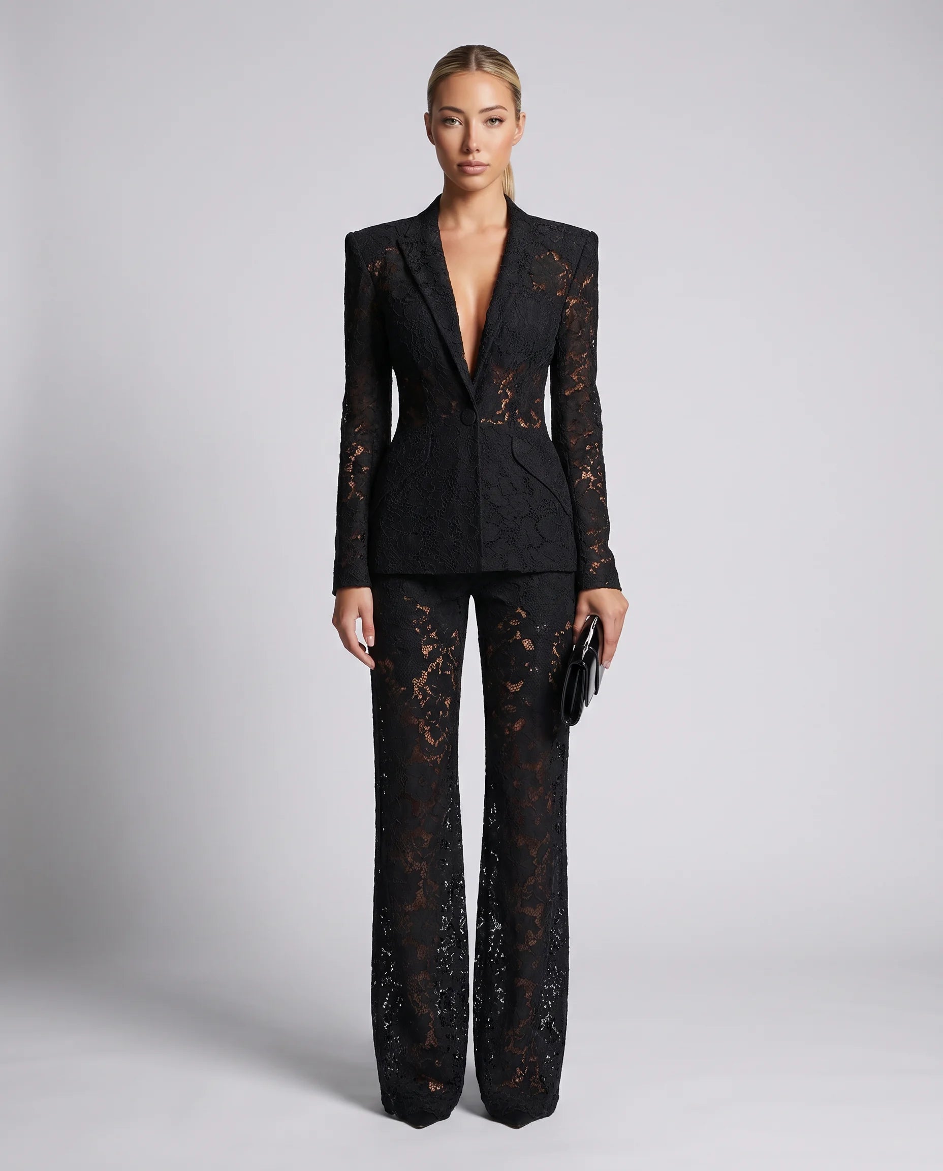 Women's black lace tailored blazer and wide leg trouser set with floral lace detailing and elegant evening silhouette by ILYNORA