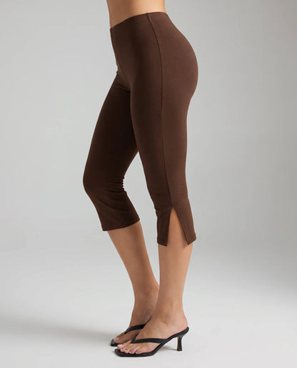Women's brown split hem capri leggings with slim stretch fit and elegant cropped silhouette by ILYNORA