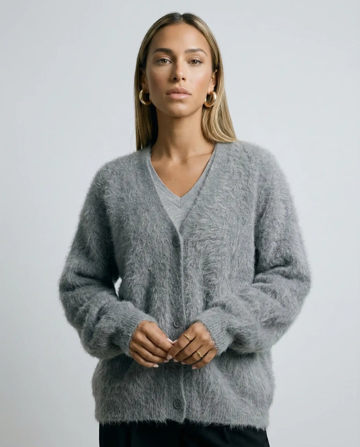 Grey brushed wool blend cardigan by Ilynora, front view with relaxed silhouette and cozy knit texture