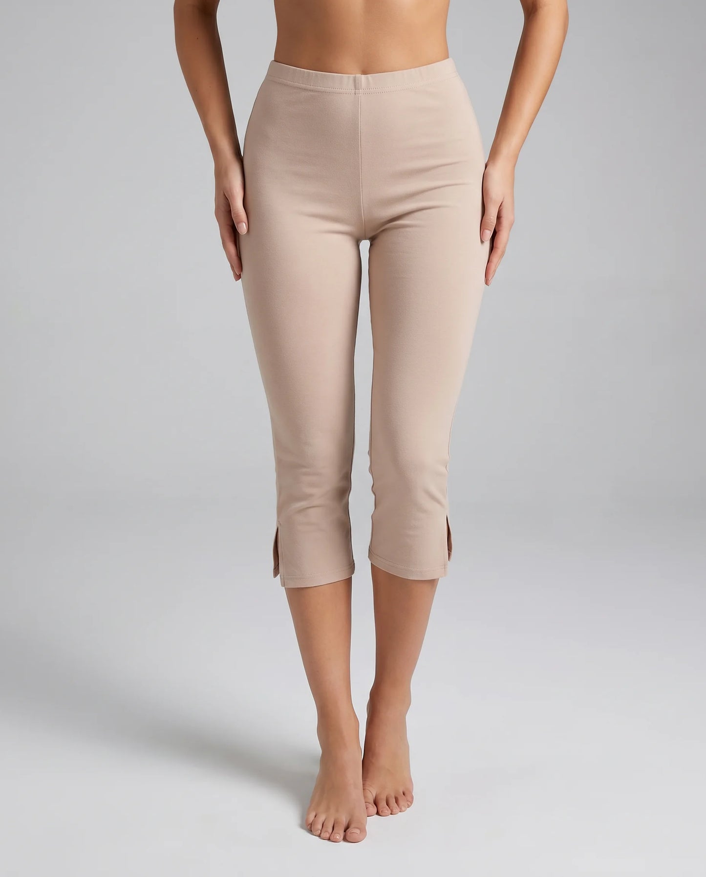 Women's camel split hem capri leggings with soft stretch fabric and flattering cropped fit by ILYNORA