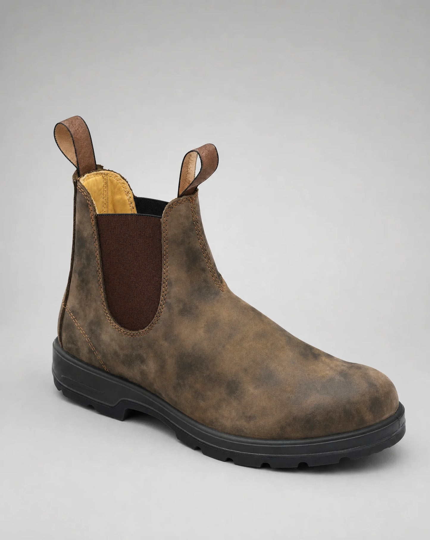 Brown Chelsea boots with elastic side panels and rugged sole for casual everyday styling by ILYNORA