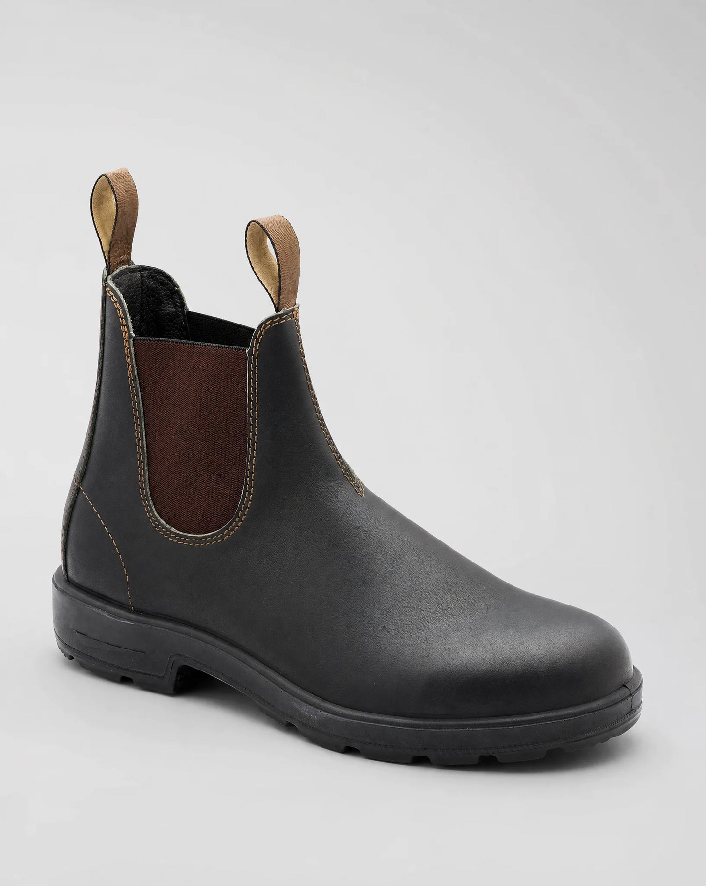 Dark brown Chelsea boots with pull tabs and durable tread sole for versatile daily wear by ILYNORA