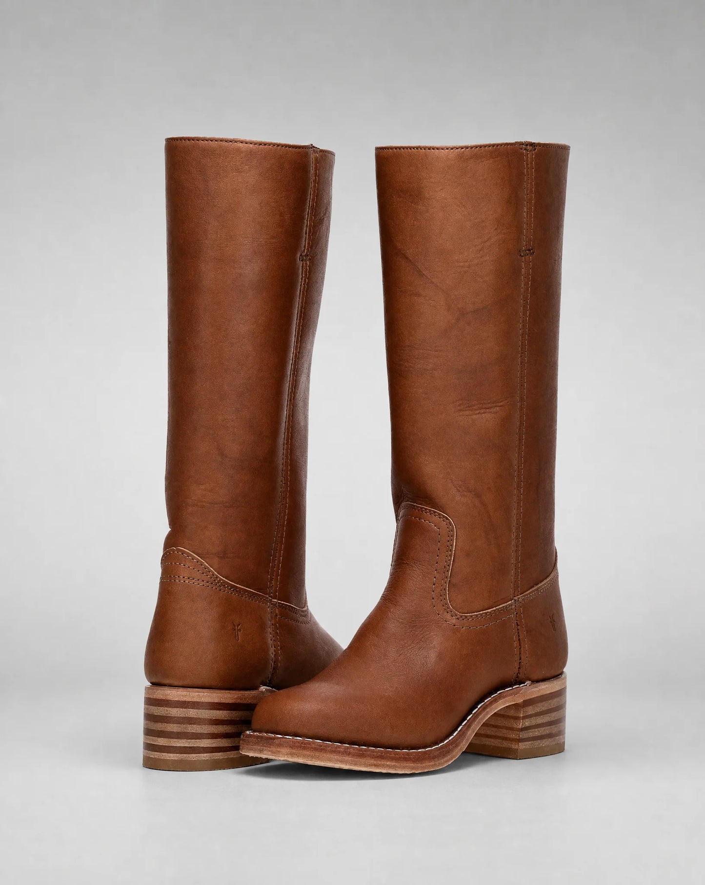 Women's brown leather cowboy boots with knee-high design and versatile western-inspired style by ILYNORA