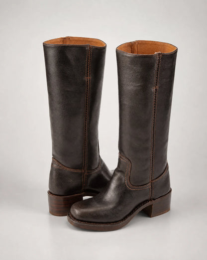 Women's dark brown cowboy style leather boots with knee-high shaft and classic western design by ILYNORA