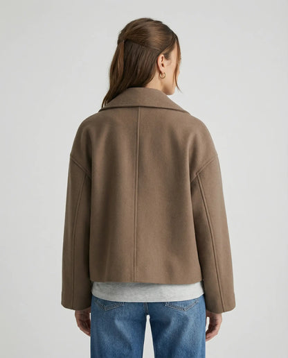 Brown cropped double-breasted jacket by Ilynora, back view highlighting structured silhouette and clean design