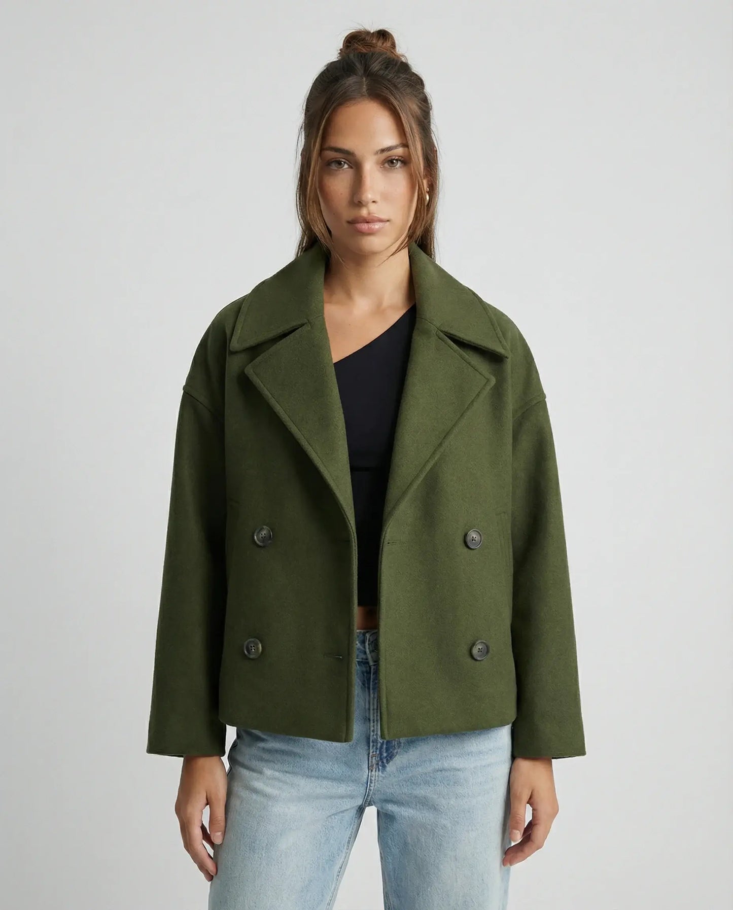 Green cropped double-breasted jacket by Ilynora, front view with tailored fit and clean design