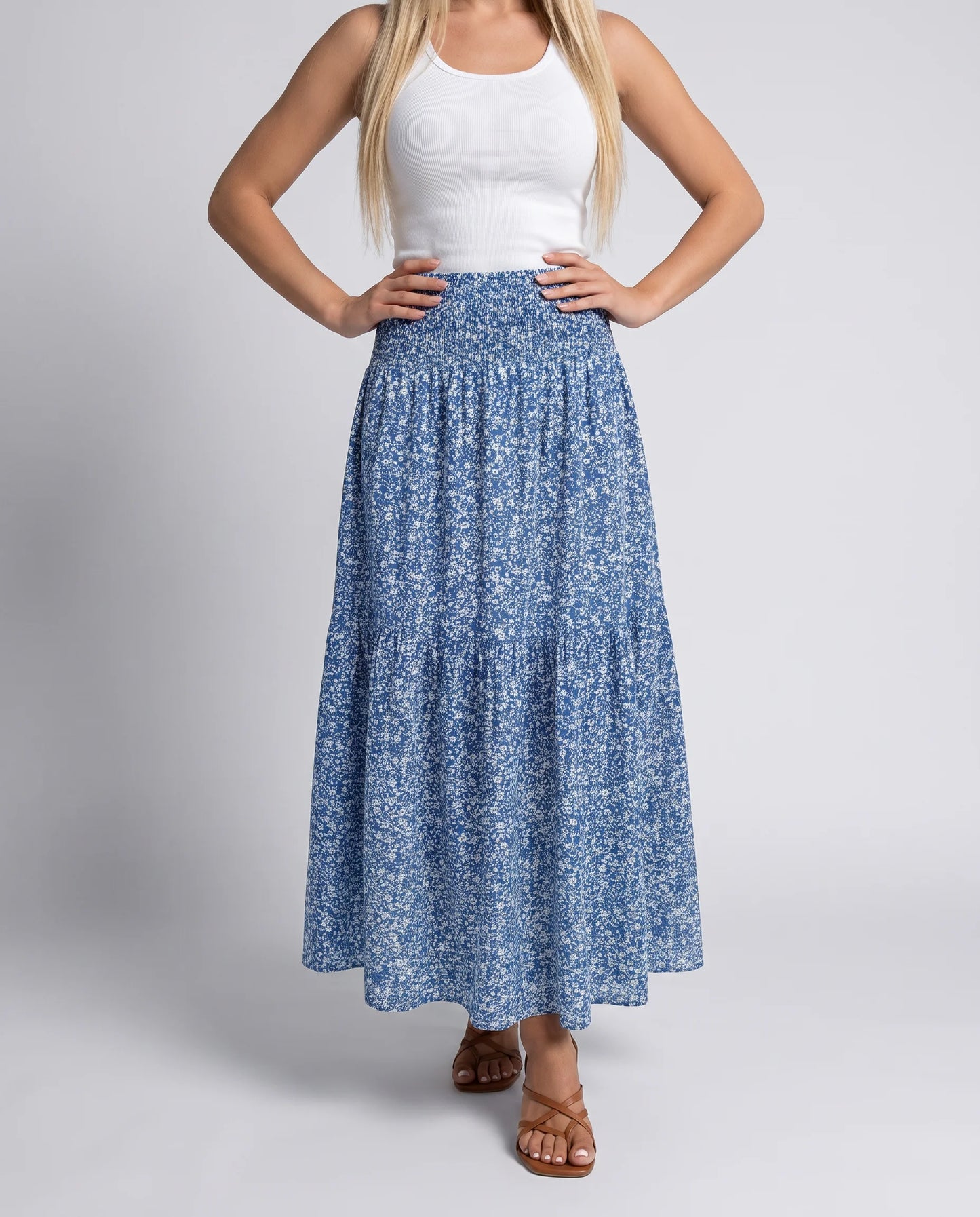 Women's blue floral midi skirt with high waist silhouette and graceful movement by ILYNORA
