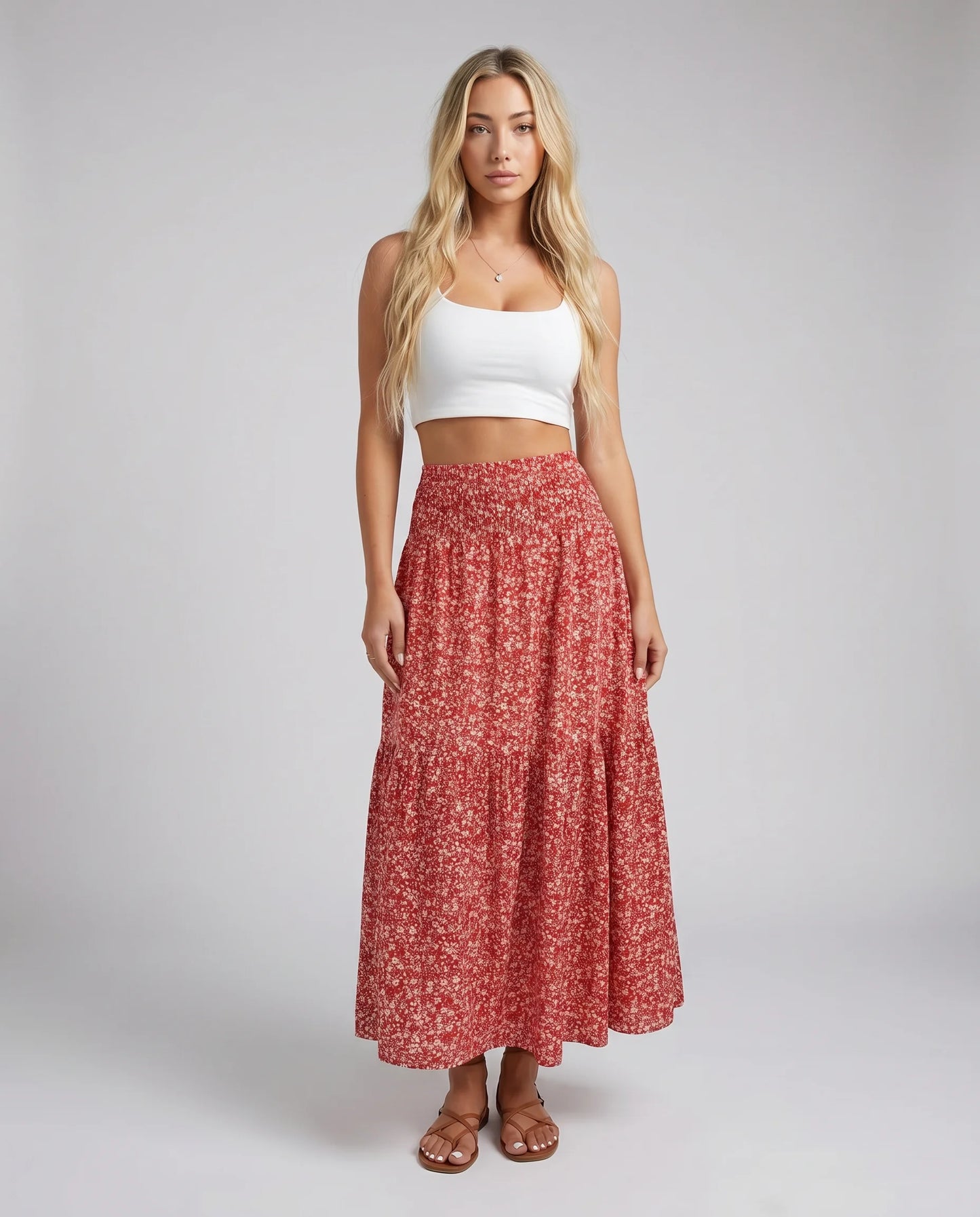 Women's red floral midi skirt with flowing tiered style and feminine summer look by ILYNORA