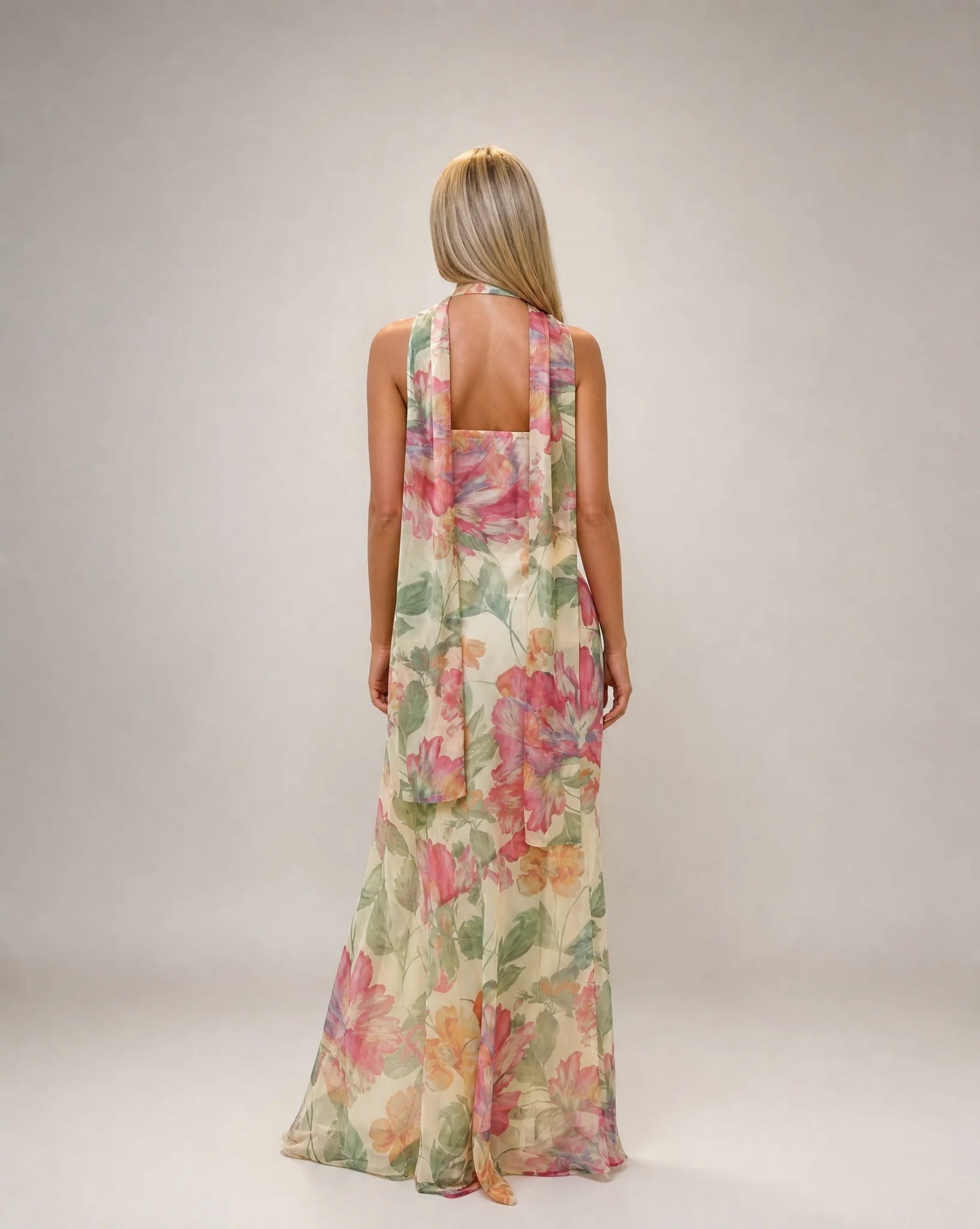Creme floral scarf neck maxi dress back view with open back detail and flowing silhouette by ILYNORA