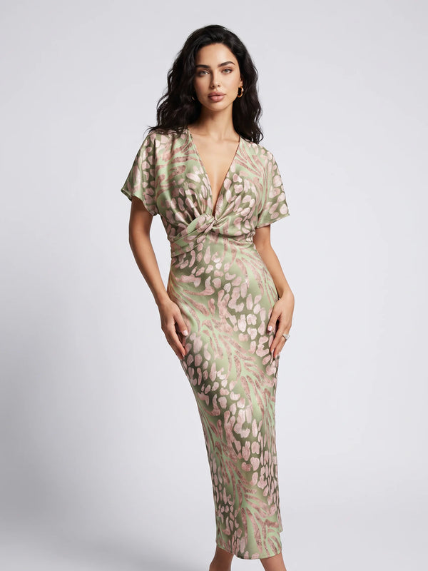 Light green floral wedding guest maxi dress with twist front detail and elegant V neckline by ILYNORA