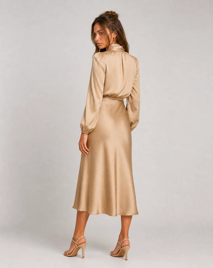 Beige high neck long sleeve midi dress side view with flowing skirt and refined silhouette by ILYNORA