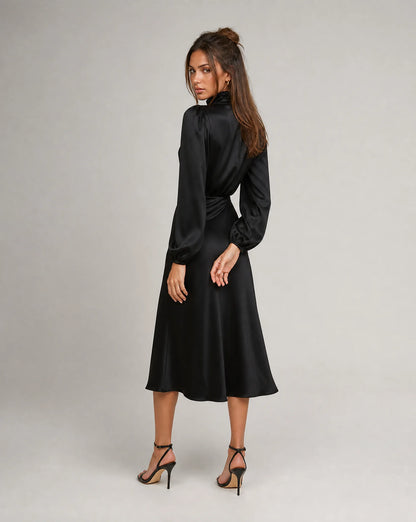 Black high neck long sleeve midi dress back view with elegant drape and formal event styling by ILYNORA