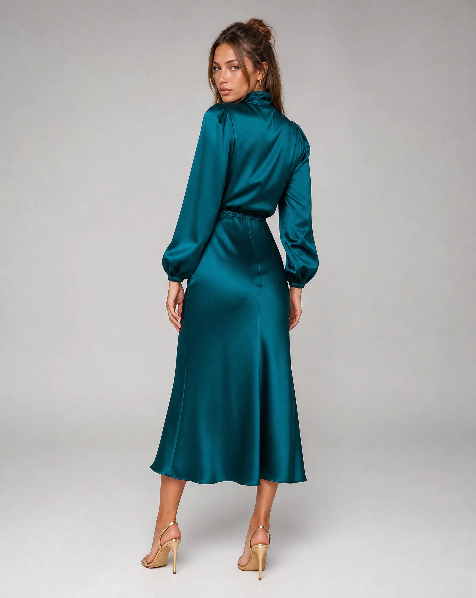 Teal blue high neck long sleeve midi dress back view with flowing silhouette and elegant styling by ILYNORA