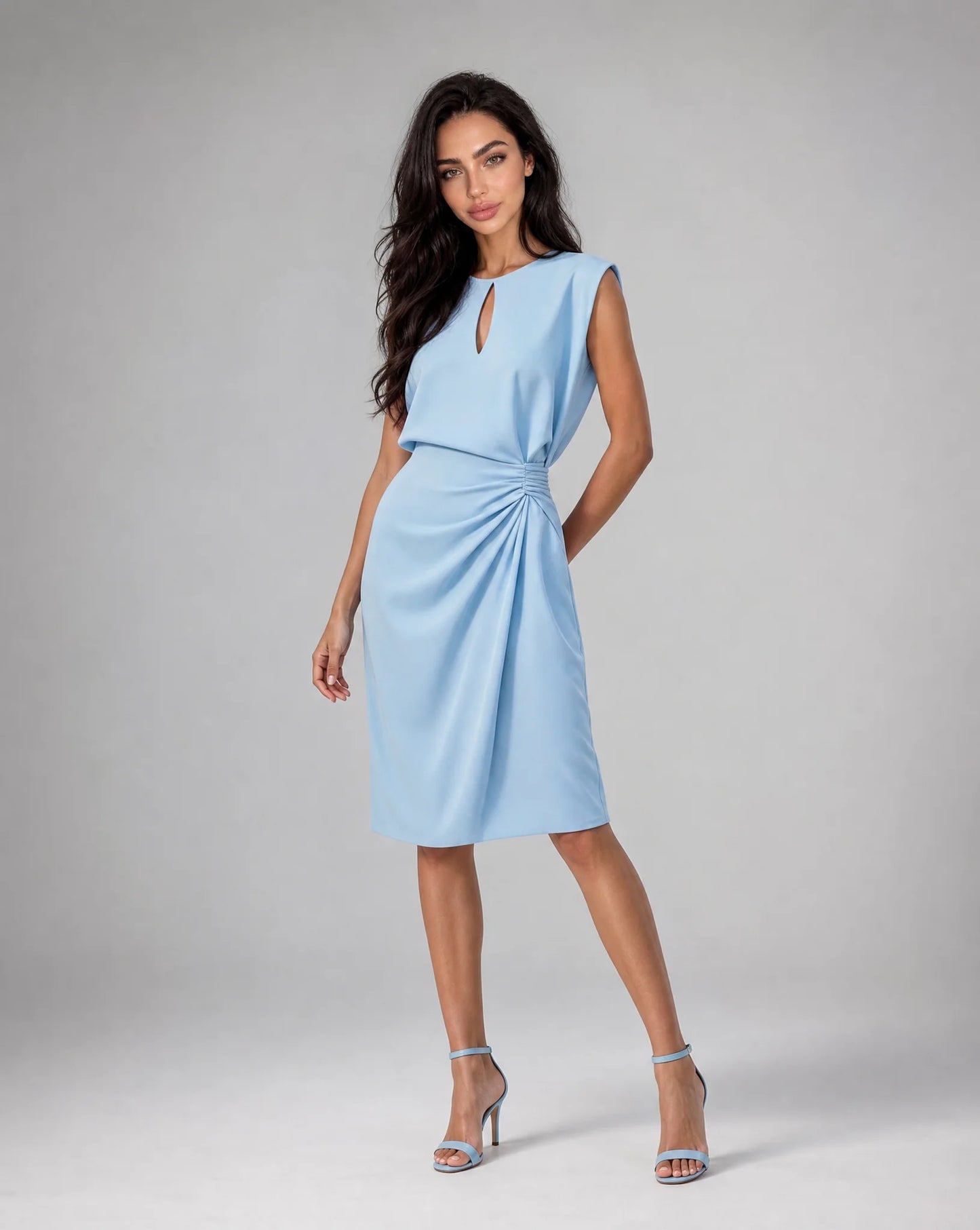 Light blue keyhole neck midi cocktail dress with ruched waist and elegant wedding guest styling by ILYNORA