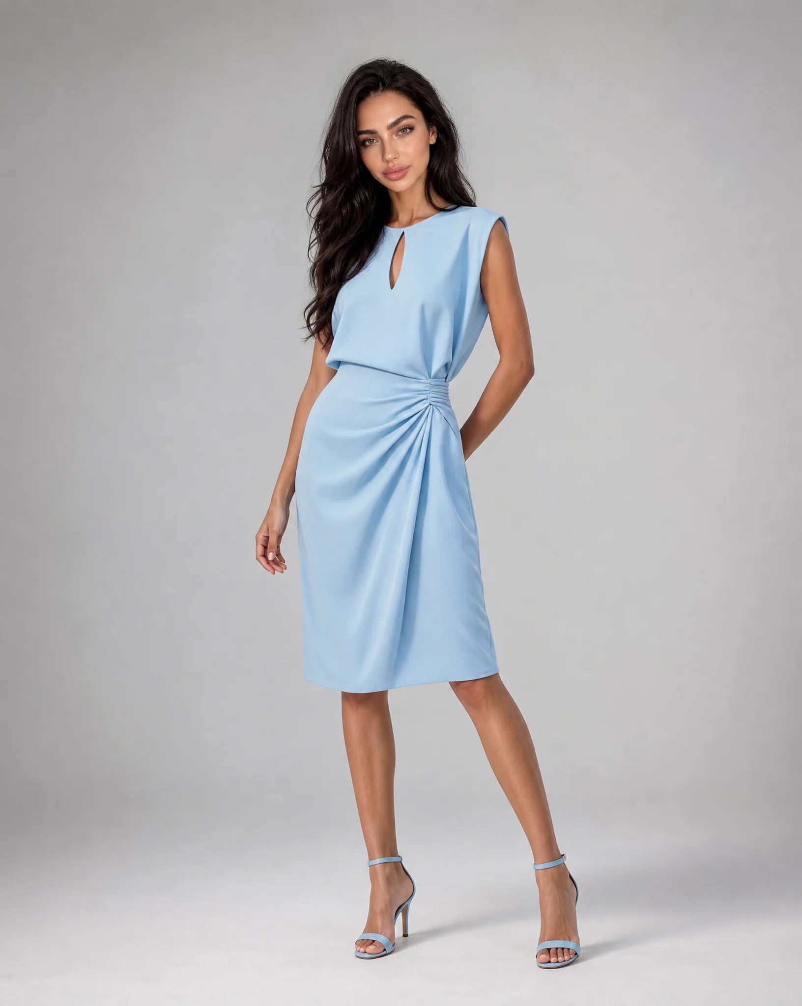 Light blue keyhole neck midi cocktail dress with ruched waist and elegant wedding guest styling by ILYNORA