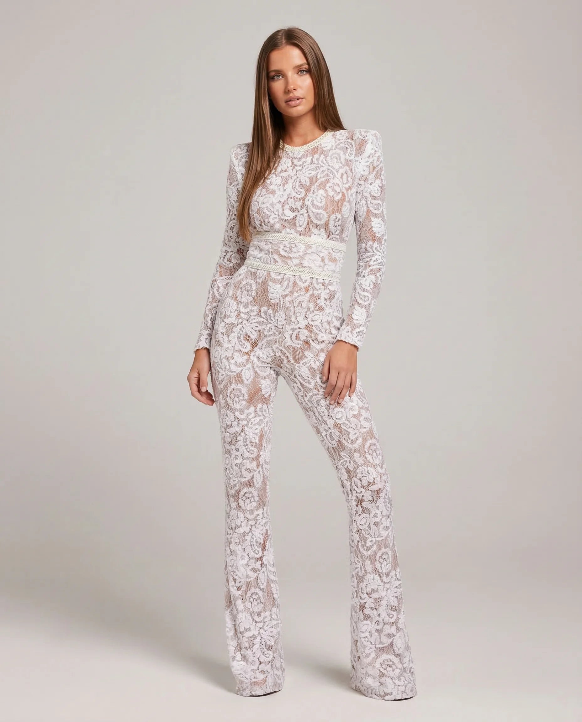 Women's lace flare leg jumpsuit in white by Ilynora, front view with fitted bodice and flared legs