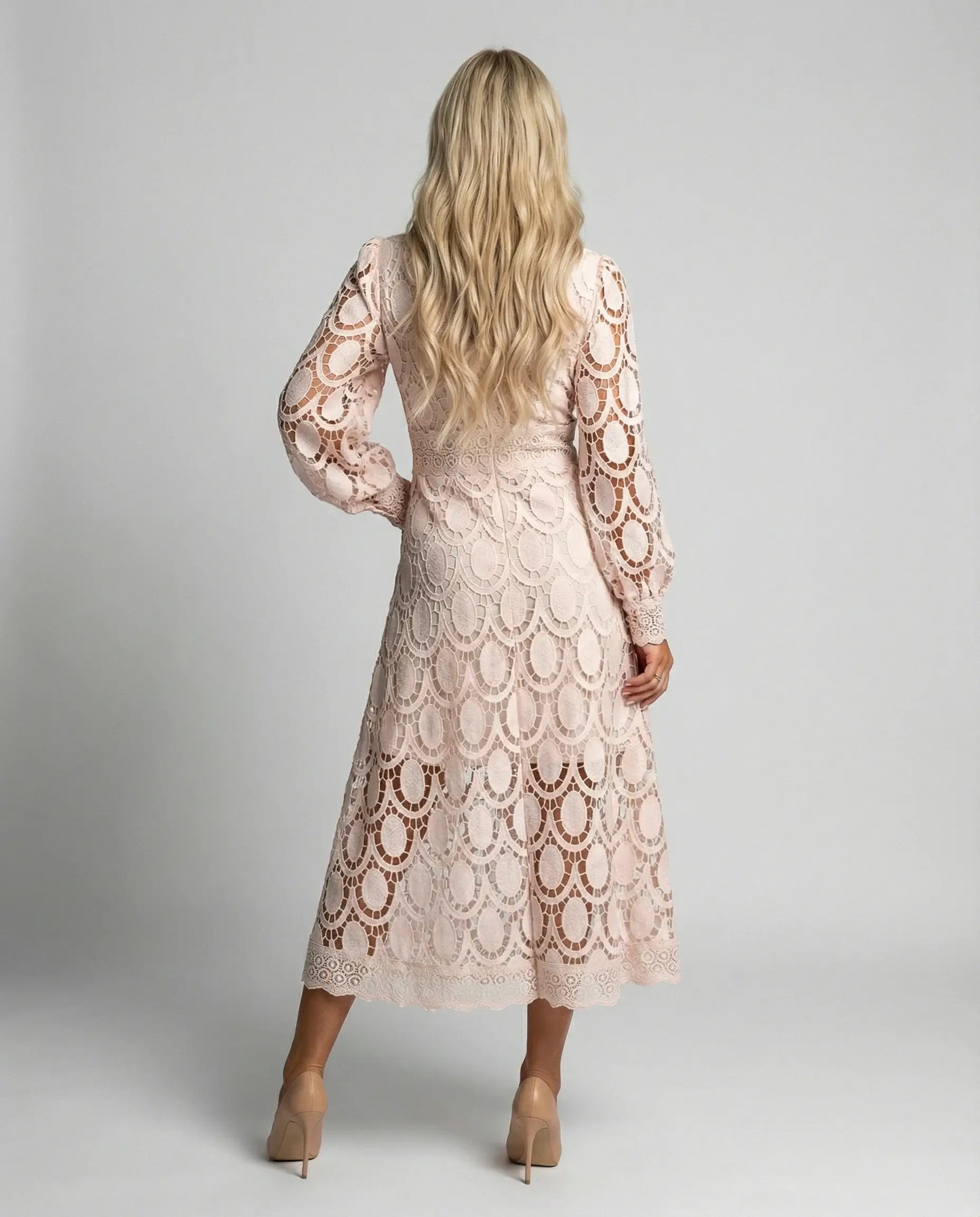 Apricot lace long sleeve midi dress for women by Ilynora London, back view showing elegant fitted design for special occasions