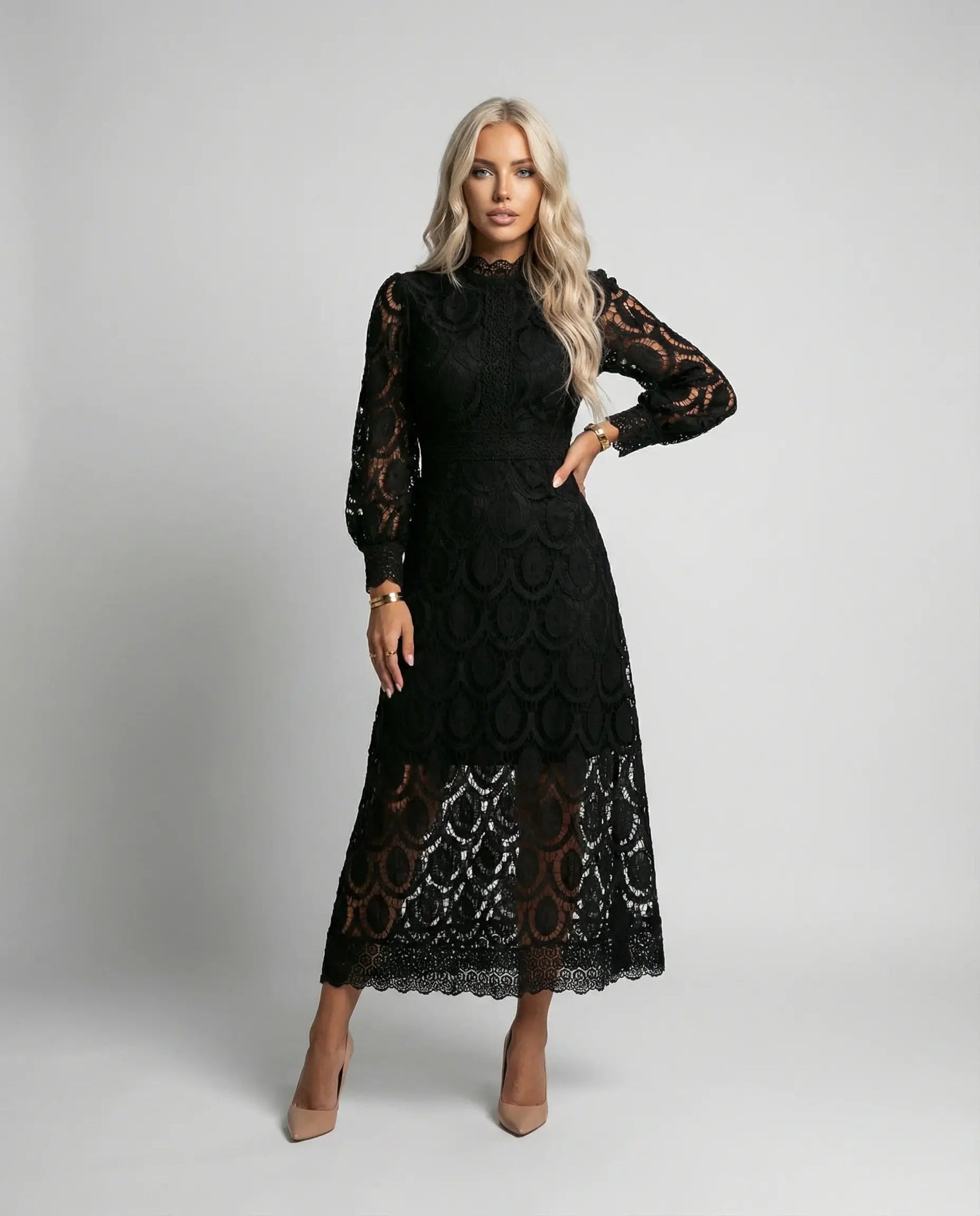 Black lace long sleeve midi dress for women by Ilynora London, elegant fitted design for special occasions