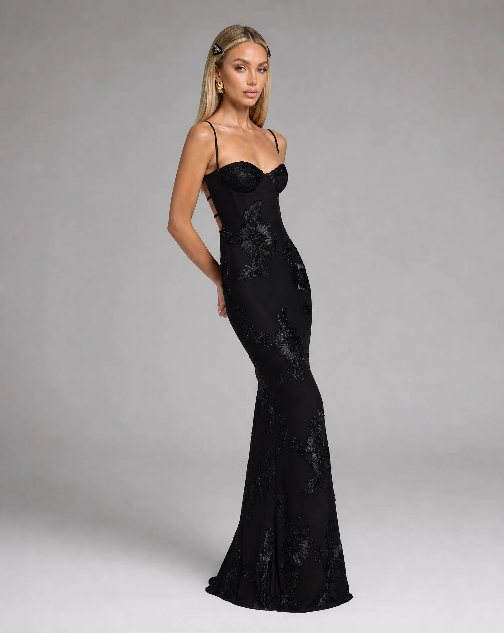 Black floral lace up back maxi dress side view with flattering fitted bodice by ILYNORA