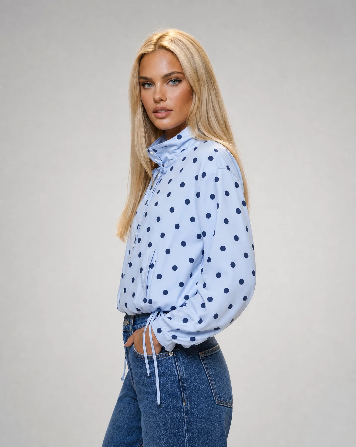 Women's blue polka dot jacket with funnel neck and comfortable lightweight design by ILYNORA