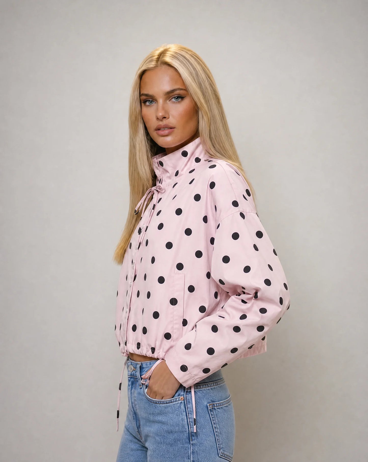Women's pink polka dot jacket with adjustable drawstring hem and casual chic look by ILYNORA