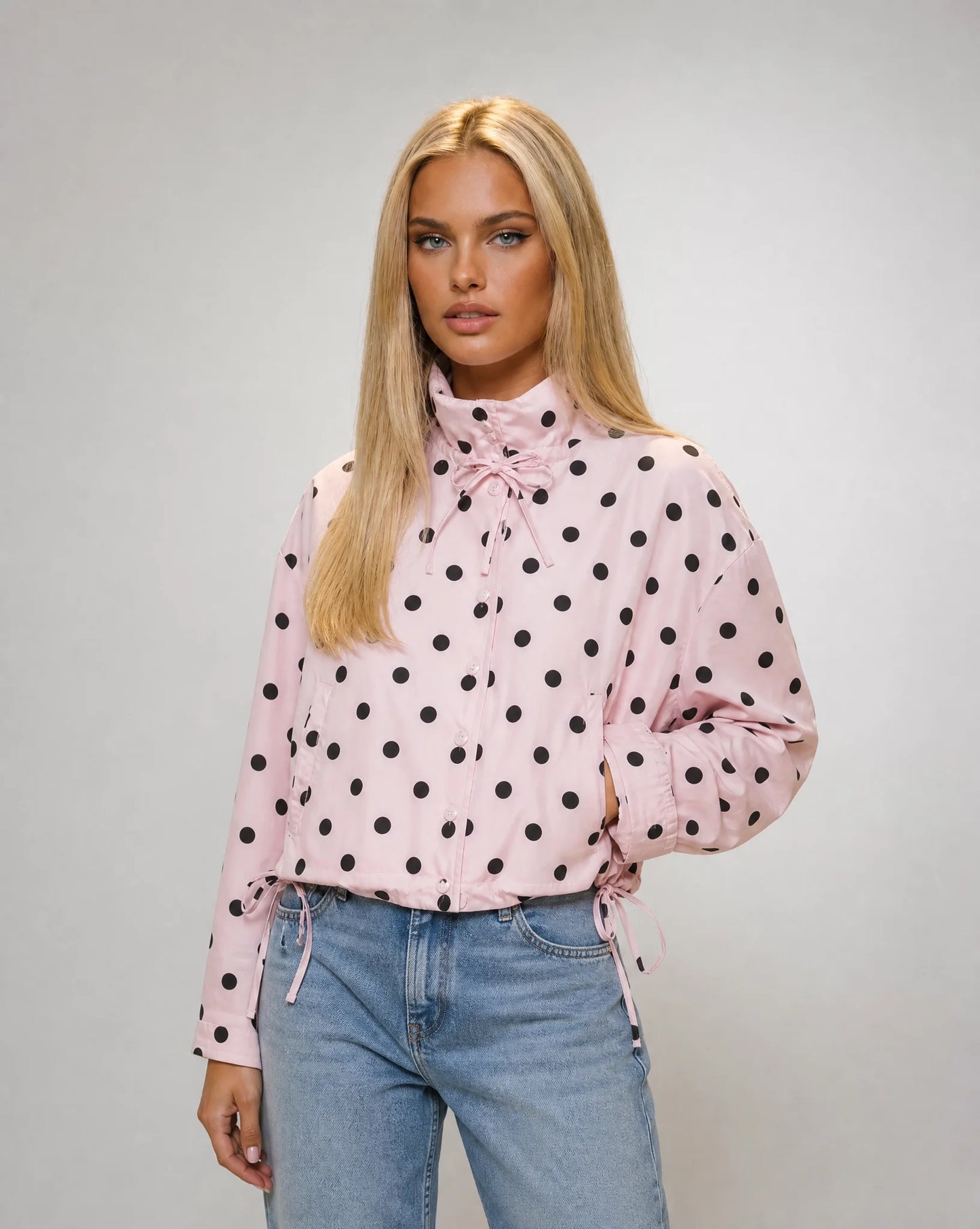 Women's pink polka dot lightweight jacket with funnel neck and relaxed everyday style by ILYNORA