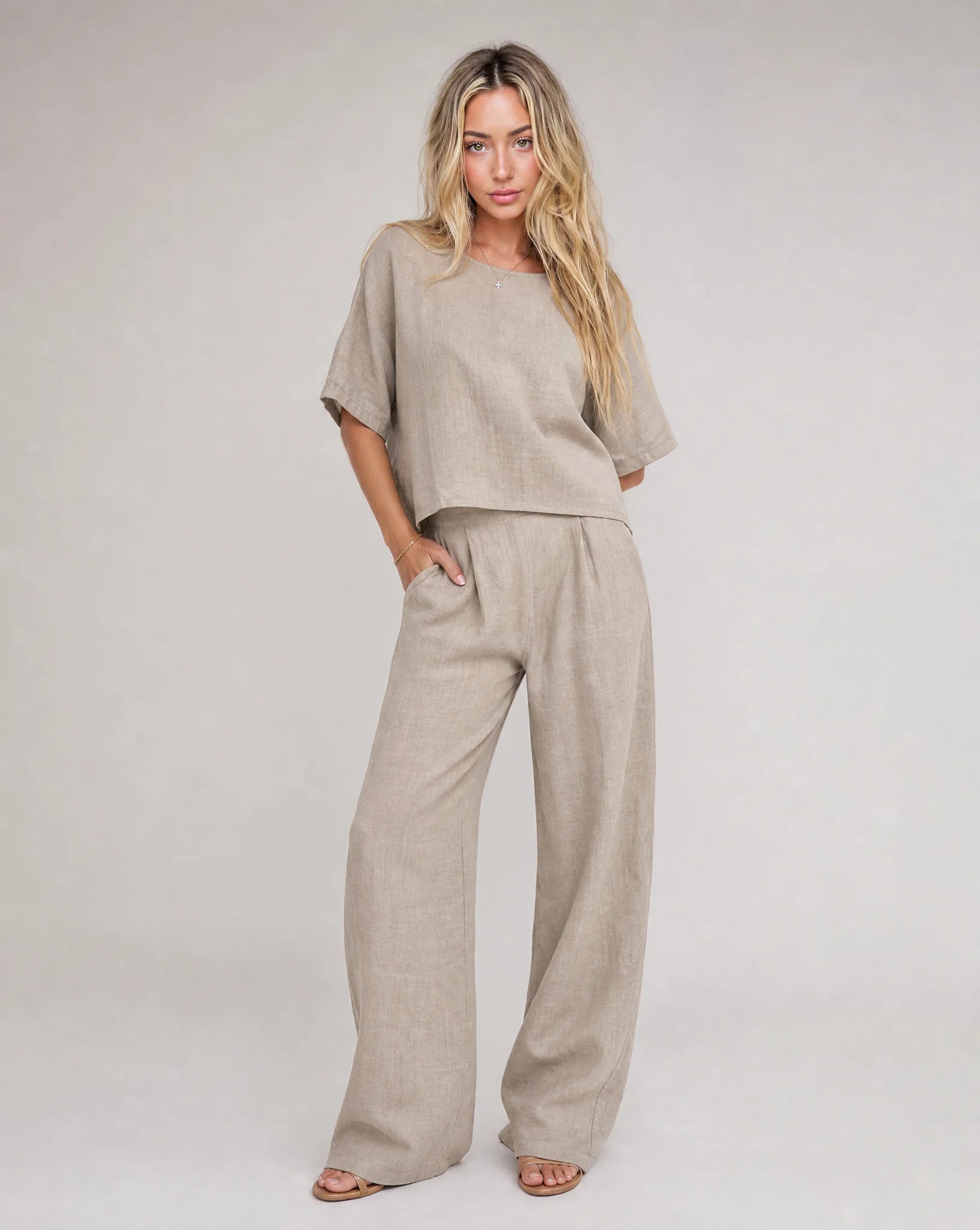 Women's light grey linen wide leg summer trouser set with relaxed fit and matching top by ILYNORA