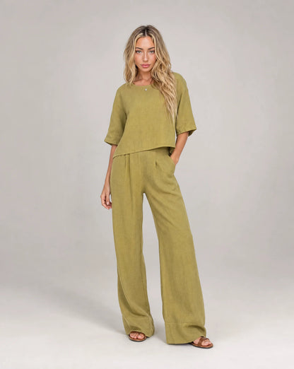 Women's yellow linen wide leg summer trouser set with relaxed fit and matching top by ILYNORA
