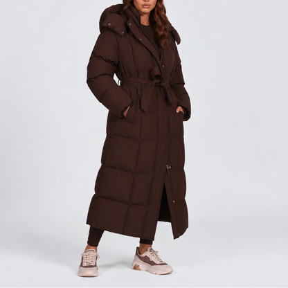 Women's long hooded puffer coat styled outfit