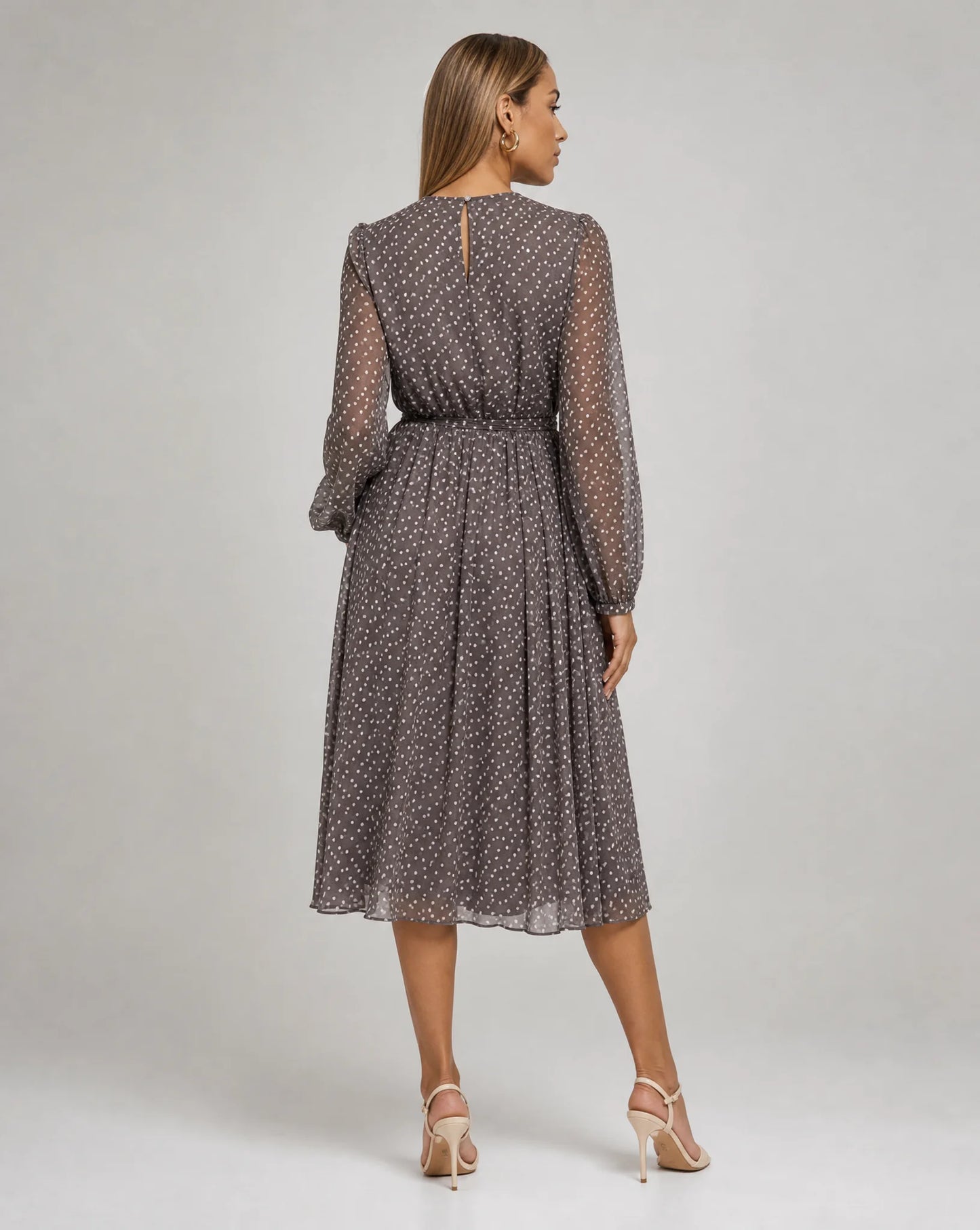 Women's grey long sleeve polka dot midi dress viewed from the back by ILYNORA