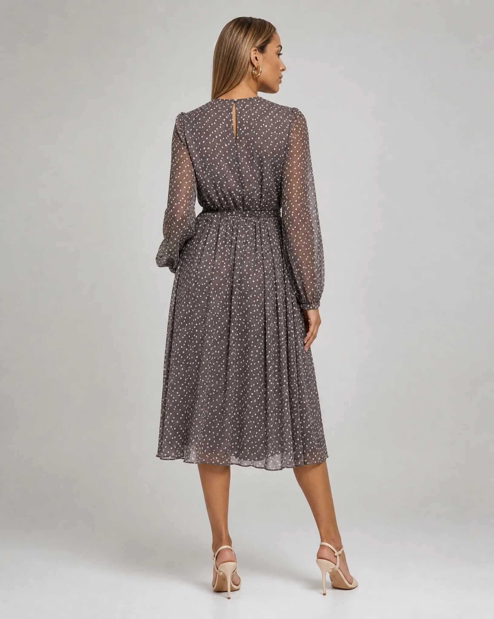 Women's grey long sleeve polka dot midi dress viewed from the back by ILYNORA