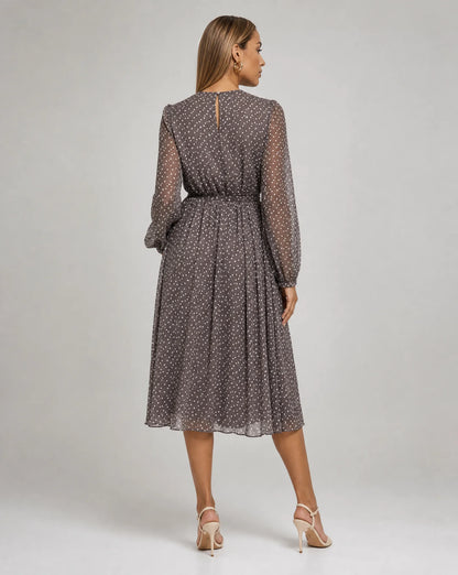 Women's grey long sleeve polka dot midi dress viewed from the back by ILYNORA