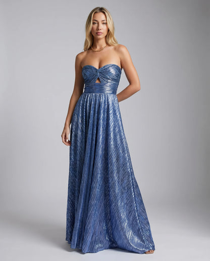 Blue metallic pleated maxi dress with twisted strapless bodice and flowing floor length skirt by ILYNORA