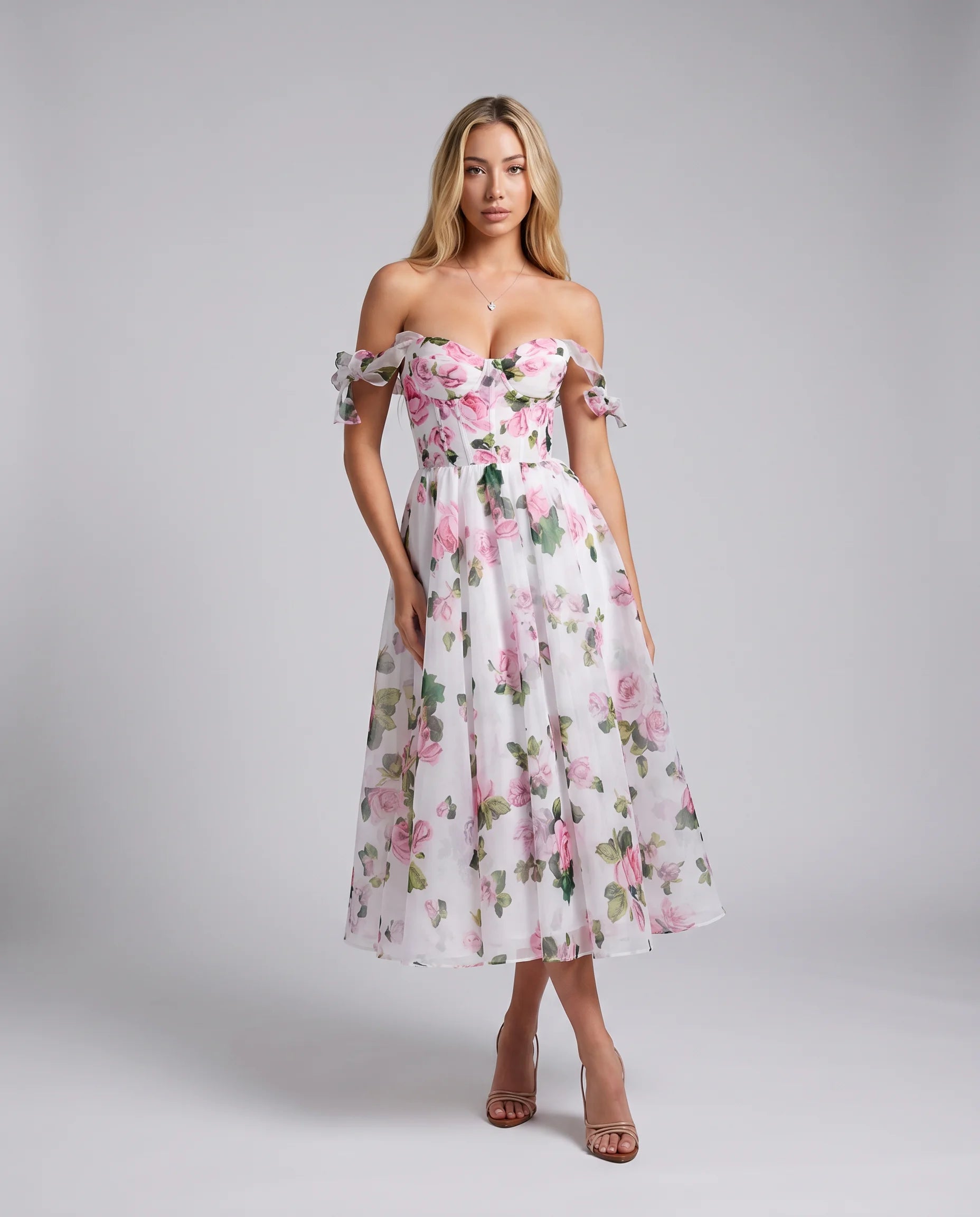 Pink floral midi dress with off shoulder neckline and flowing A-line skirt for summer weddings by ILYNORA