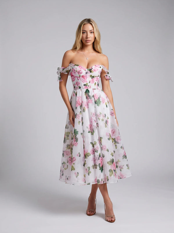 Pink floral midi dress with off shoulder neckline and flowing A-line skirt for summer weddings by ILYNORA