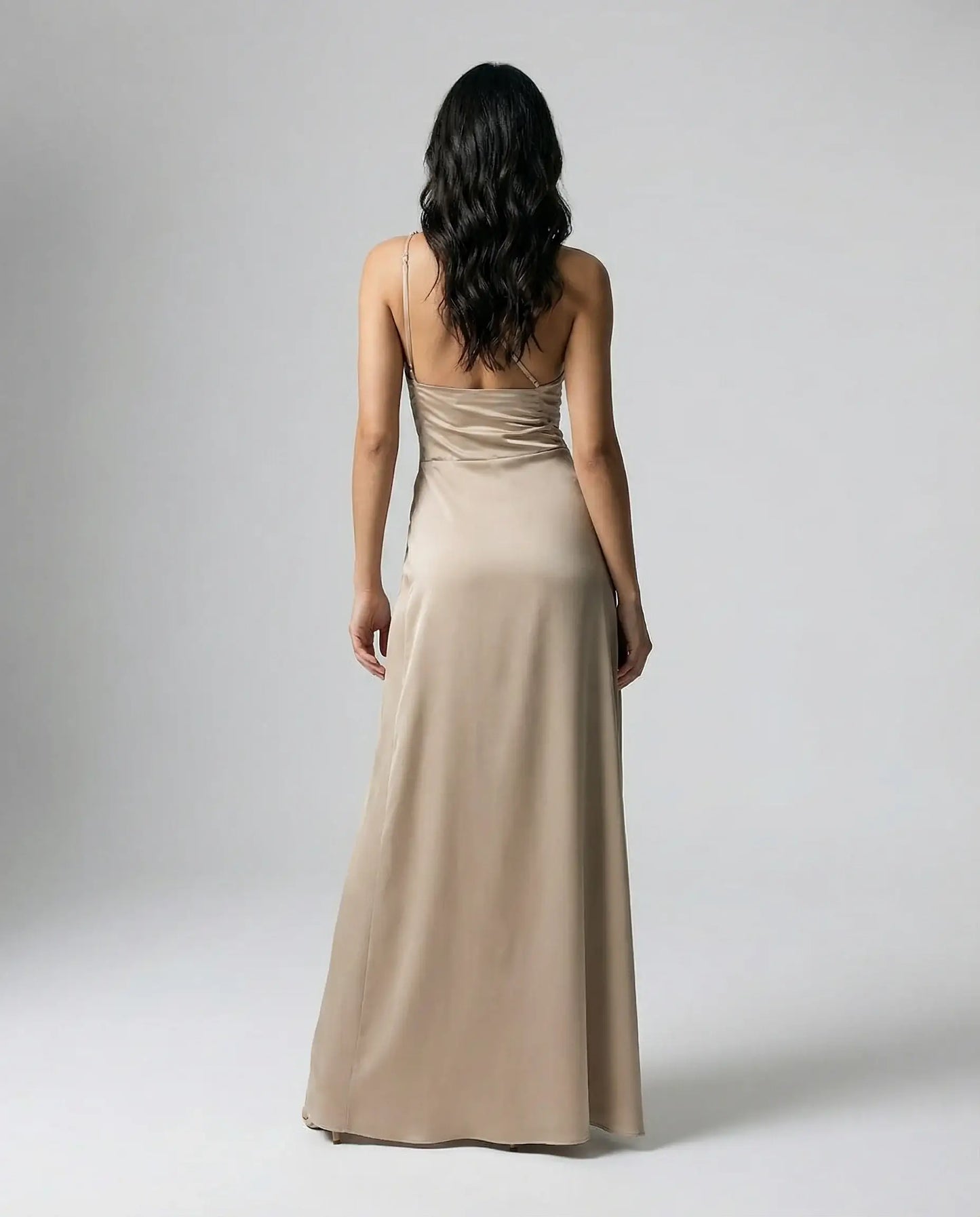 Beige one-shoulder satin maxi dress for women by Ilynora, back view highlighting asymmetrical design and elegant fit