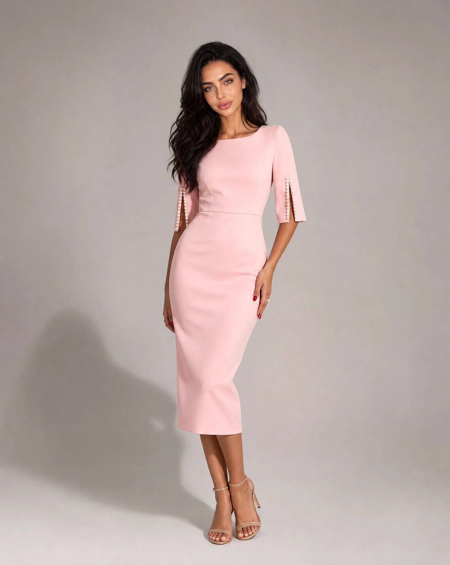 Women's pink pearl sleeve midi dress with feminine tailored fit and elegant event styling by ILYNORA